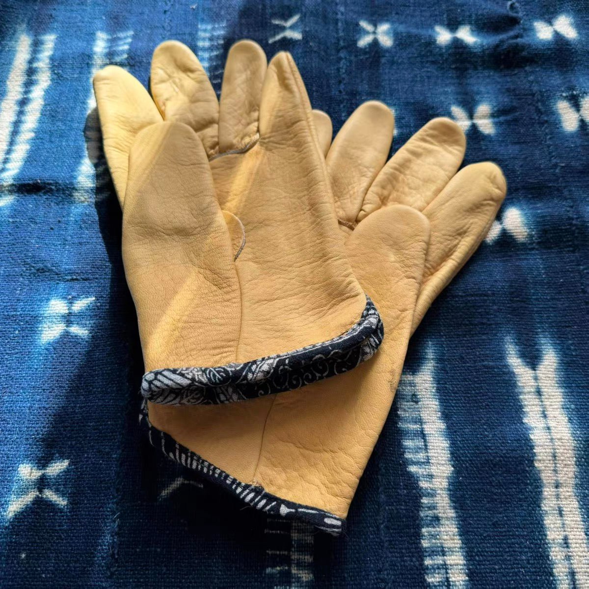 Natural deerskin distressed motorcycle gloves blue dyed edging VISVIM