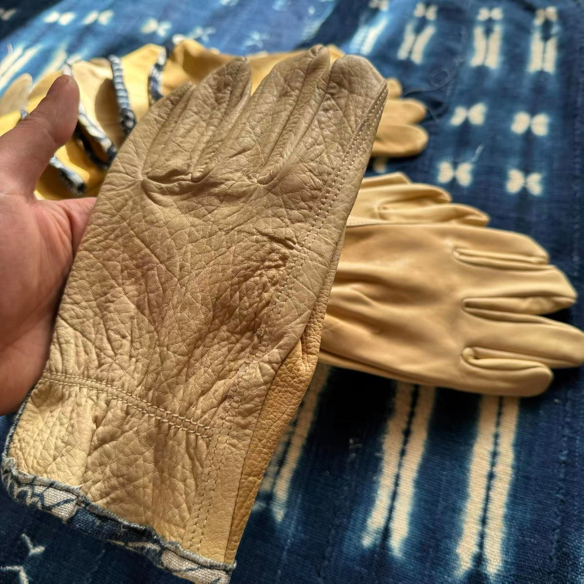 Natural deerskin distressed motorcycle gloves blue dyed edging VISVIM